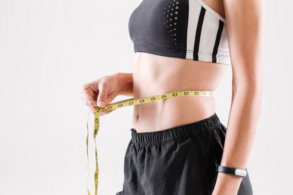 Medical weight loss in Sacramento CA showing waist measurement during physician-guided weight management